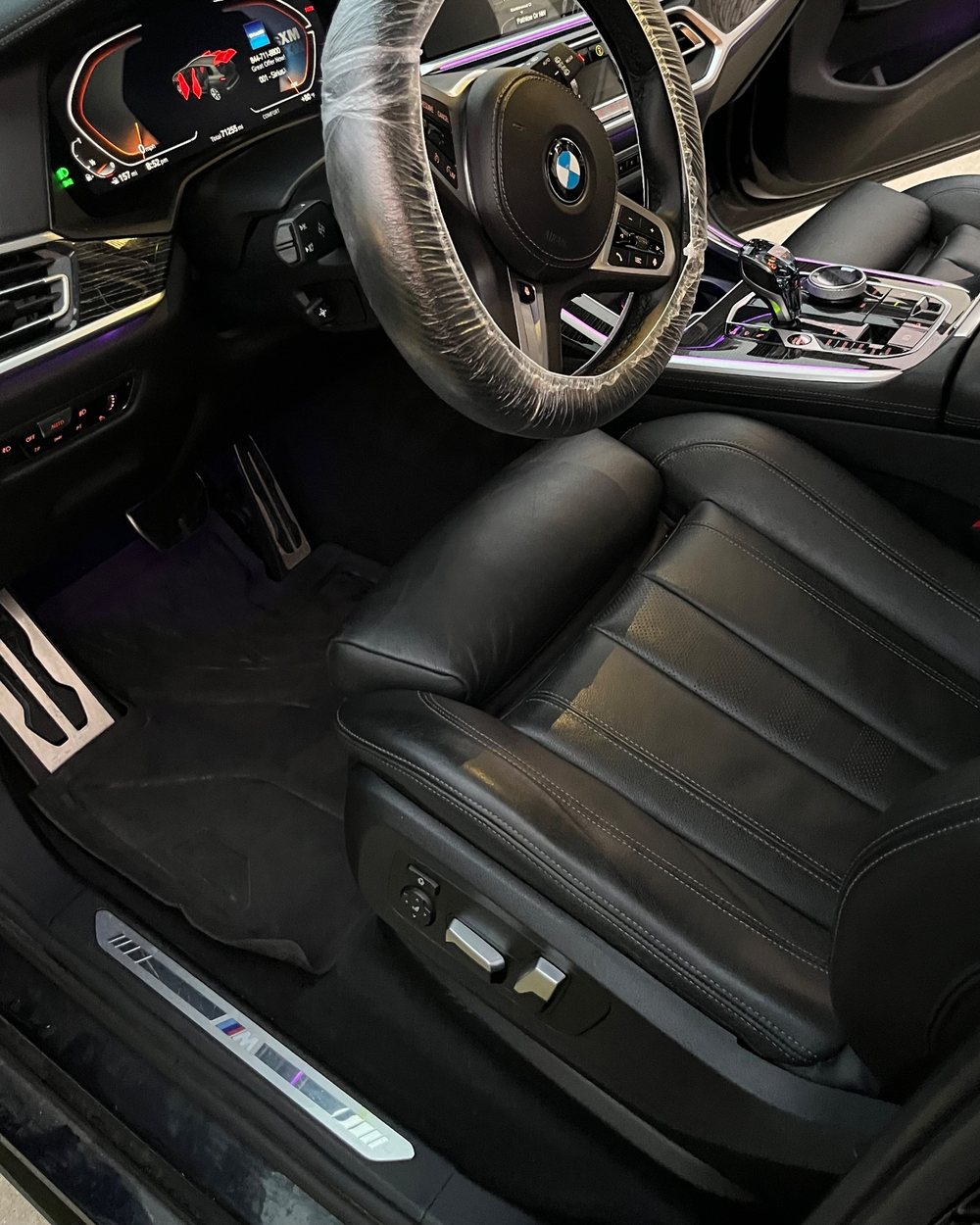 A BMW cabin with the dash and console finished by Alum Auto Detailing, Westerville