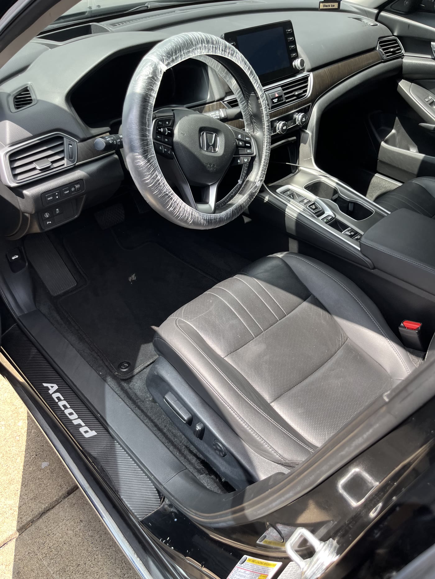 Steering wheel and dash cleaned down by Alum Auto Detailing, Westerville